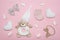 Cute baby girl clothes and accessories  soft white hearts  teddy bear  sweets  bows  socks. Happy Valentine day concept