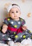 Cute baby girl in dotted dress