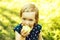 Cute baby girl eats apple