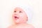 Cute Baby Girl Laughing and Wearing a Soft Knit Bear Ears Hat