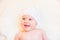 Cute Baby Girl Laughing and Wearing a Soft Knit Bear Ears Hat