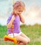 Cute baby girl on the swing