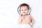 Cute baby with headphones
