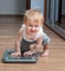 Cute baby on home scales