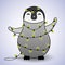 Cute baby penguin entangled in Christmas fairy lights