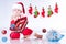 Cute baby Santa Claus with Christmas toys