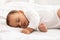 Cute Baby Toddler Sleeping Peacefully Lying In Bed At Home