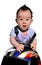 Cute baby uses motorcycle helmet