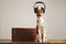 Cute basenji dog wearing headphones