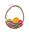 A cute basket of Easter eggs with a pink rabbit ears ribbon