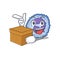 Cute basophil cell cartoon character having a box