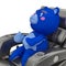 cute bear is relaxing on the recliner chair close up