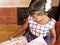 Cute beautiful kid reading in creche