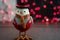 Cute bird wearing winter houndstooth clothing, scarf and hat in front of red bokeh background