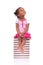 Cute black african american little girl seated in a stack of boo
