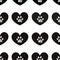 Cute black hearts and doodle white paws. Fabric design seamless pattern