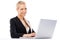 Cute blond business woman working on laptop