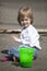 Cute Blonde Child Playing at the Beach