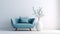 cute blue loveseat sofa or snuggle chair and pot with branch