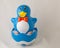 Cute blue roly-poly Penguin baby toy stock photo with copy space