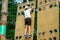 Cute boy enjoying activity in climbing adventure park at sunny summer day. Kid climbing in rope playground structure.