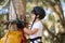 Cute boy enjoying zip line adventure on sunny day