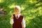 Cute boy going back to school. Child with books and loupe on first school day