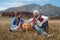 Cute boy in hat with father and Halloween Carved Pumpkin on the