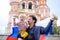 Cute boy and his father holding russian flag