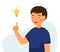 Cute boy holding lamp idea. Concept of generation ideas.