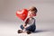 a cute boy hugging a big red heart, ai generated