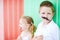 Cute boy with mustache party accessory