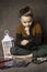 Cute boy numismatist collects old coins