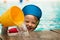 Cute boy playing with water