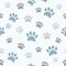 Cute boyish paw prints on seamless pattern.