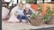 Cute brother and little sister hugging on a beautiful veranda in summer