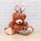 Cute brown toy with quail eggs