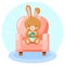 Cute bunny character seating in the armchair with cocoa vector illustration cartoon style