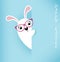 Cute bunny or rabbit girl holding wall signboard behind blue paper background