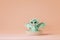 Cute cartoon baby dragon taking bath and catching soap bubbles. 3d render