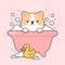 Cute cat in a bathtub and duck rubber