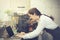 Cute Caucasian busy working with laptop on coffee shop counter