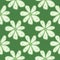 Cute chamomiles flowers seamless pattern on green background. Abstract daisies floral endless wallpaper