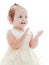 Cute cheerful little girl claps her hands
