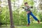 Cute child boy playing. Artworks depict games at eco resort which includes flying fox or spider net. Every childhood matters.