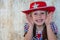 Cute child dressed as cowboy / cowgirl