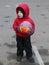 Cute child played with multicolored ball in his hands