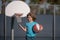 Cute child playing basketball. Active kids lifestyle. Little child boy playing basket ball. Basketball kids school.