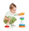 Cute child playing colorful tower