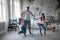 Cute children helping their daddy with housework